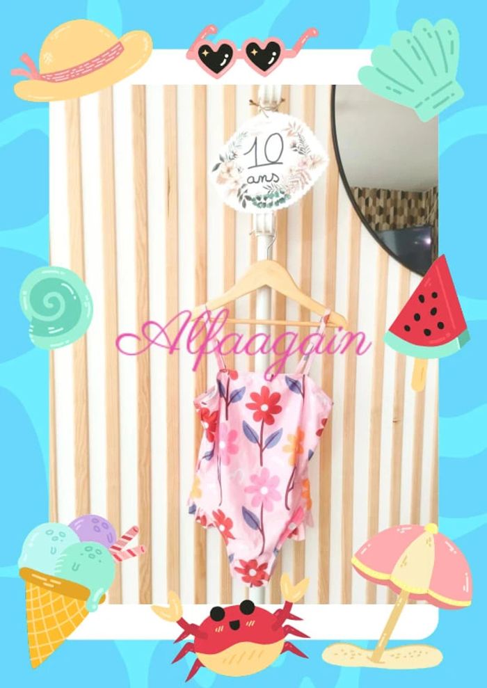 Maillot de bain neuf rose fleuri 10ans