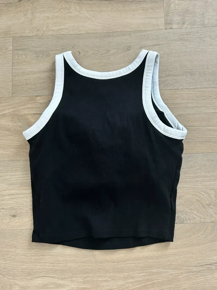 Top Uniqlo taille XS noir et blanc - photo numéro 4