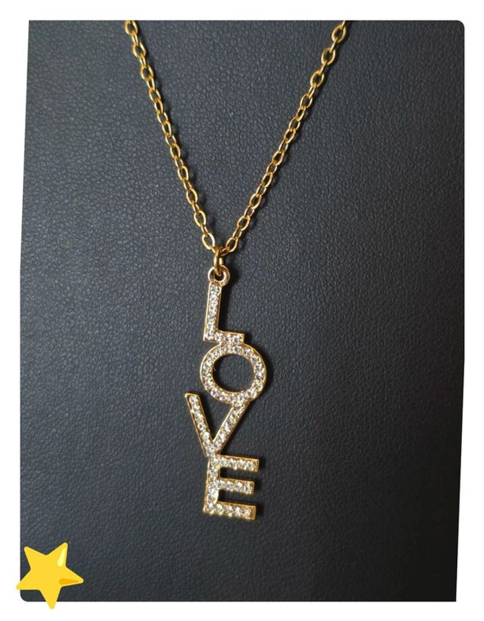 Collier pièce unique "love" acier inoxydable dorée