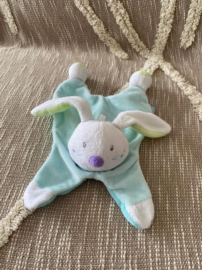 Peluche doudou plat 25cm sucre d’orge lapin bleu et blanc très bon état