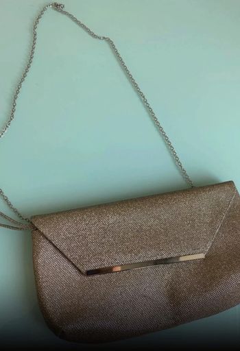 Sac à main doré neuf