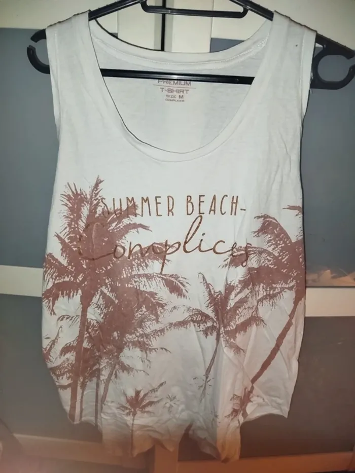 Tee, shirt sans manches