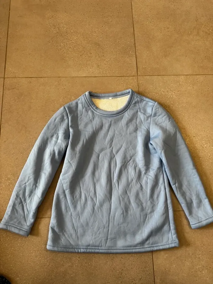 Pull pyjama bleu clair taille S, très bon état pour femme