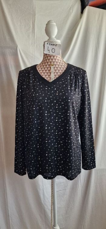 Blouse, noir à motif argenté, neuf avec étiquettes, en polyester &elasthanne, longueur 61cm