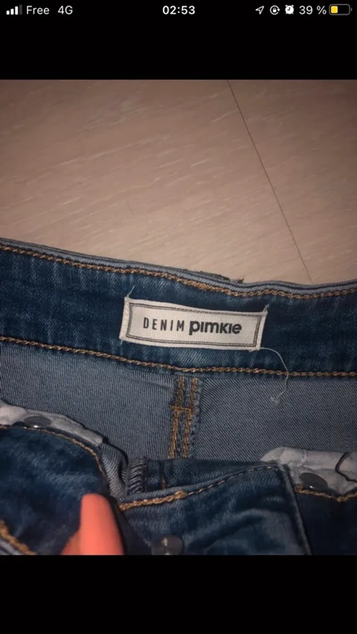 jean taille haute a troue pimkie - photo numéro 7