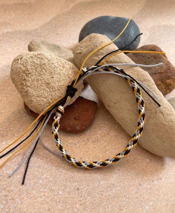 Bracelet tisse rond neuf