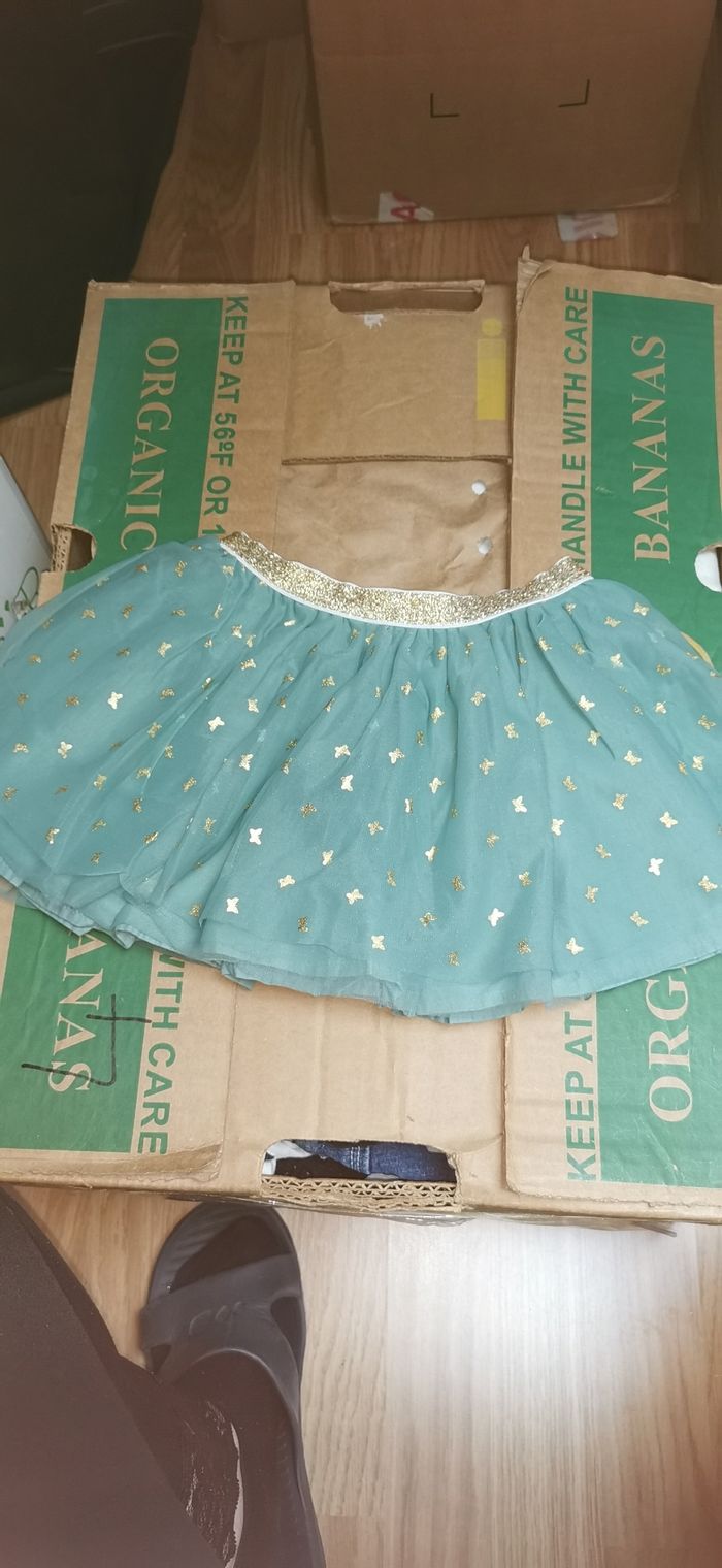 Jupe patineuse à motif papillons dorés