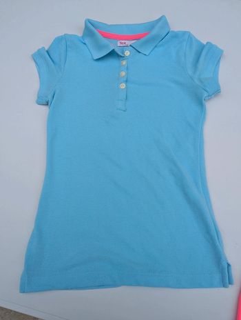Polo bleu turquoise et fuschia taille 7-8 ans