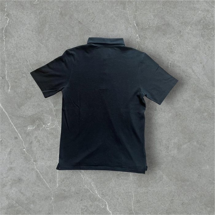 Polo homme de la marque Mavic . Taille L . Couleur noir .Très bon état - photo numéro 2