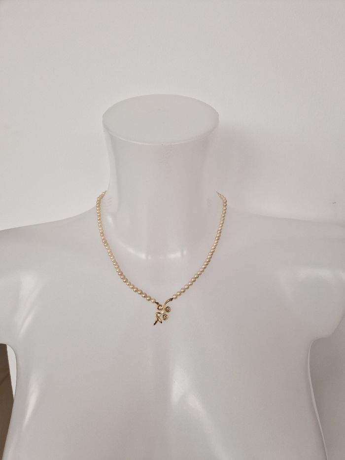 Collier vintage perles et son motif