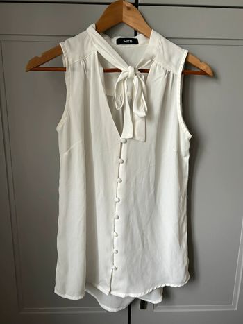 Jolie blouse blanc crème petits boutons