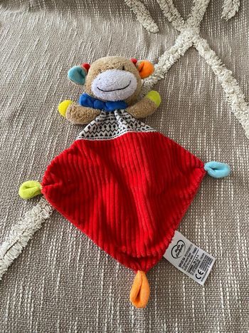 Peluche doudou plat 32cm mots d’enfants vache rouge et beige très bon état
