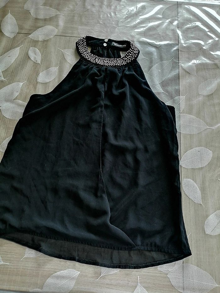 Haut noir sans manche