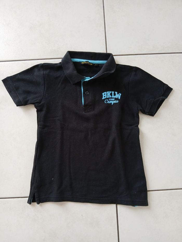 Polo noir 8 ans