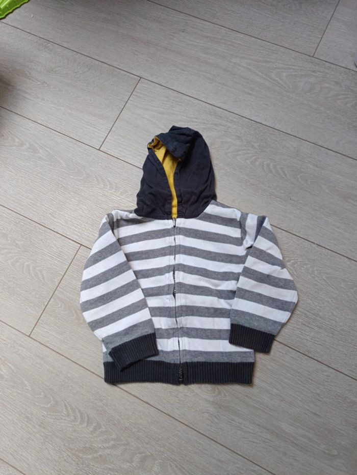 Gilet à capuche réversible