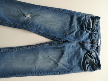 Jeans slim troué