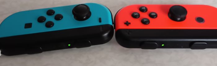 Paire de Joy-Con Nintendo Switch Rouge et Bleu 100% Officiel Nintendo Joycon - photo numéro 3