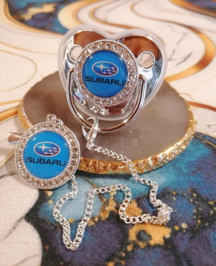 Tétine argenté subaru bleu