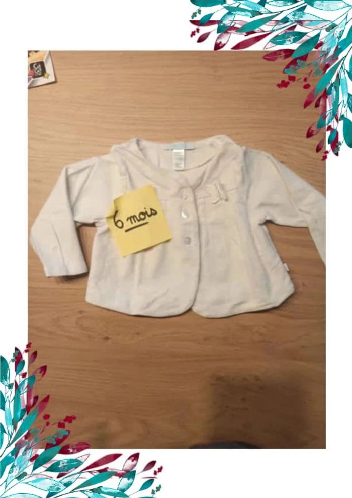 Gilet Boléro fille 6 mois. Papillon