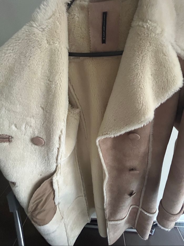 Manteau fausse fourrure très élégant