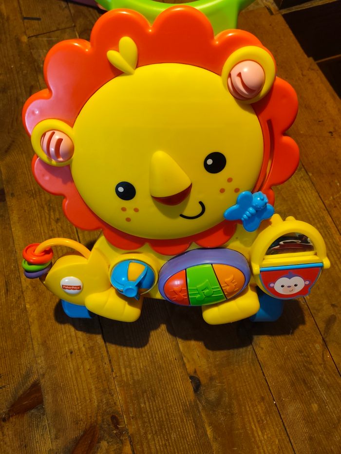 Trotteur lion musical