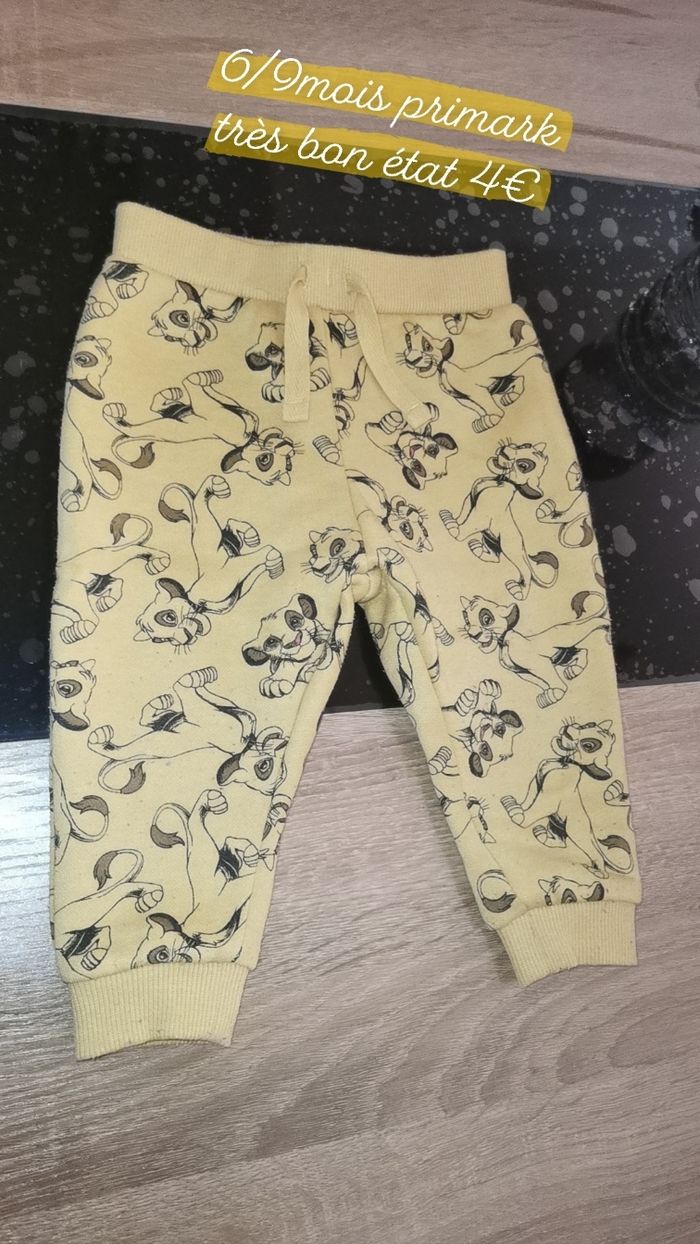 Jogging primark simba 6/9mois