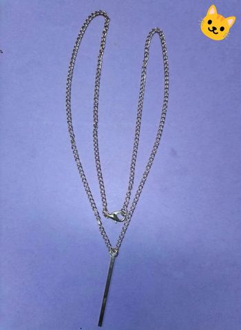 Collier doré pendentif barre