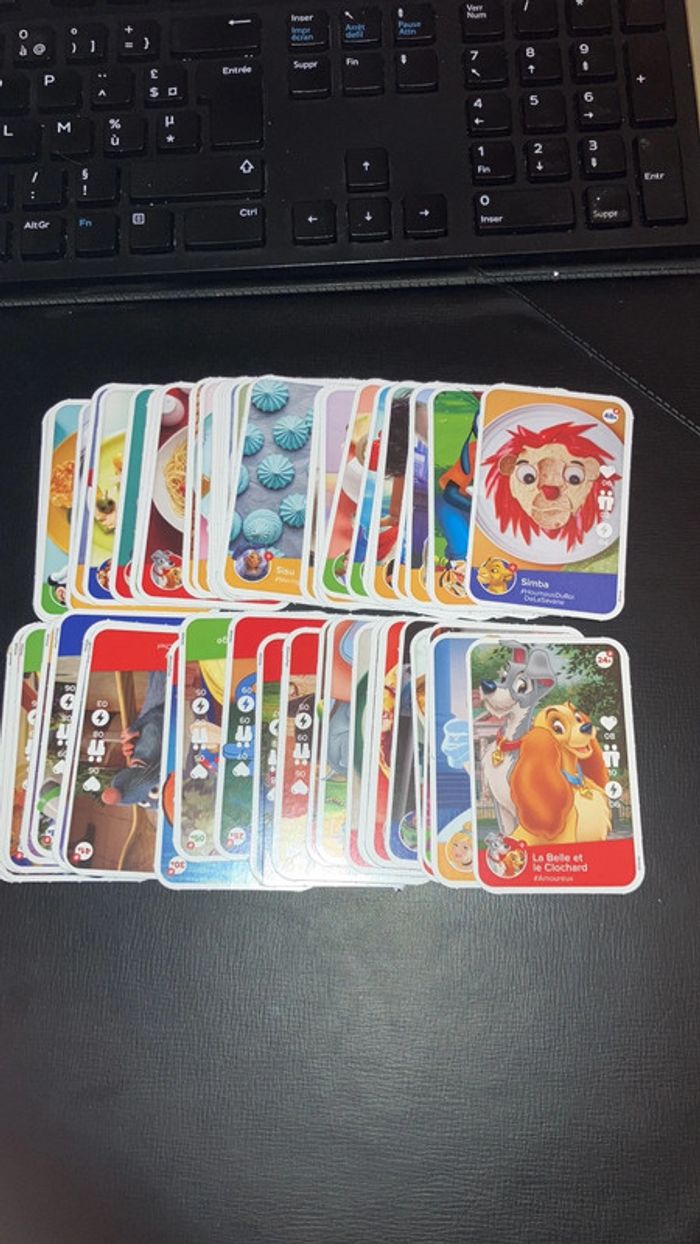 Lot de 65 images. Disney 100. Cuisinons en Famille.