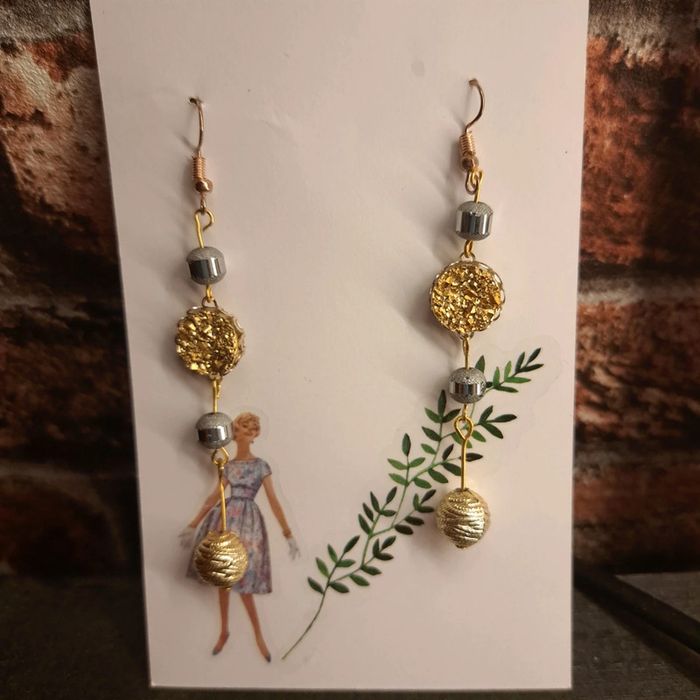 Boucles d'oreilles pendante doré et argenté