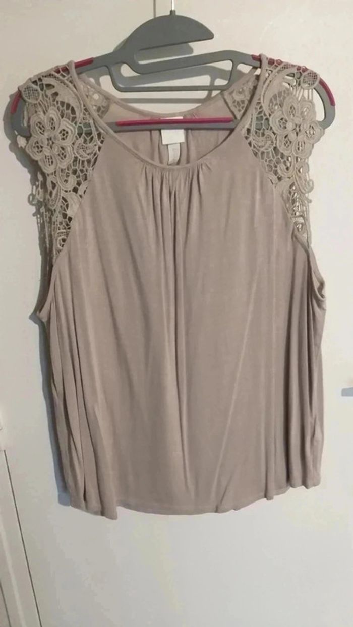 tee shirt sans manches - photo numéro 1