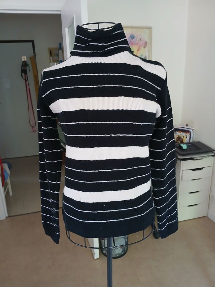 Pull col roulé