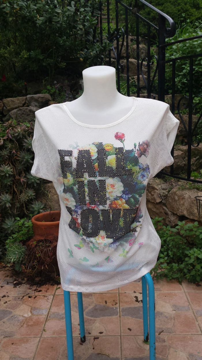 Haut en dentelle. 38.