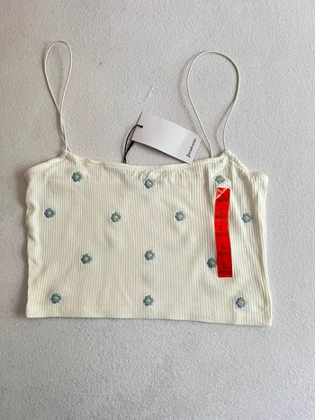 Débardeur côtelé blanc avec fleur Stradivarius L