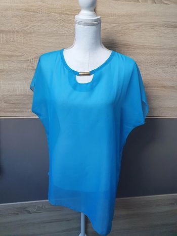 Blouse transparente.