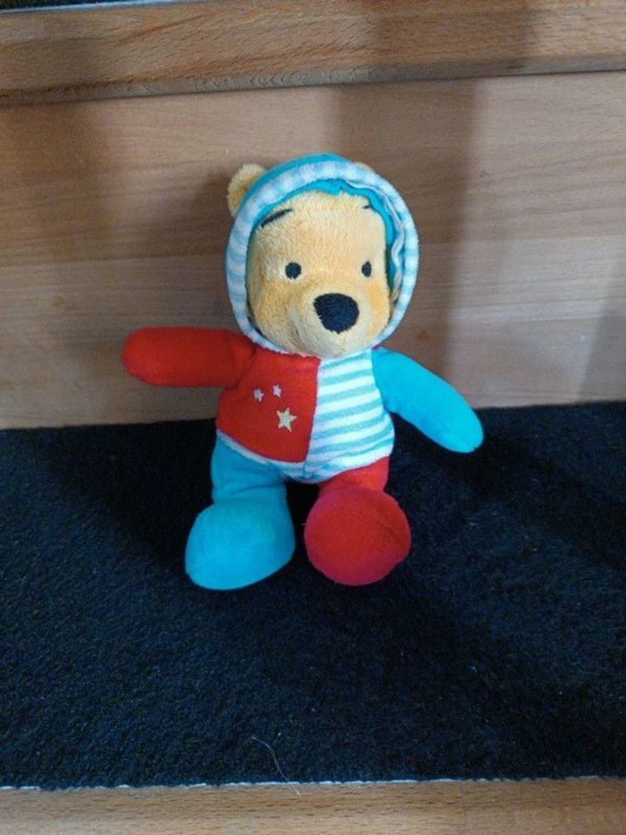 Doudou bleu Winnie l'ourson