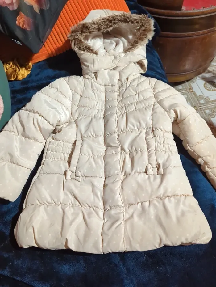 Manteau fourré crème