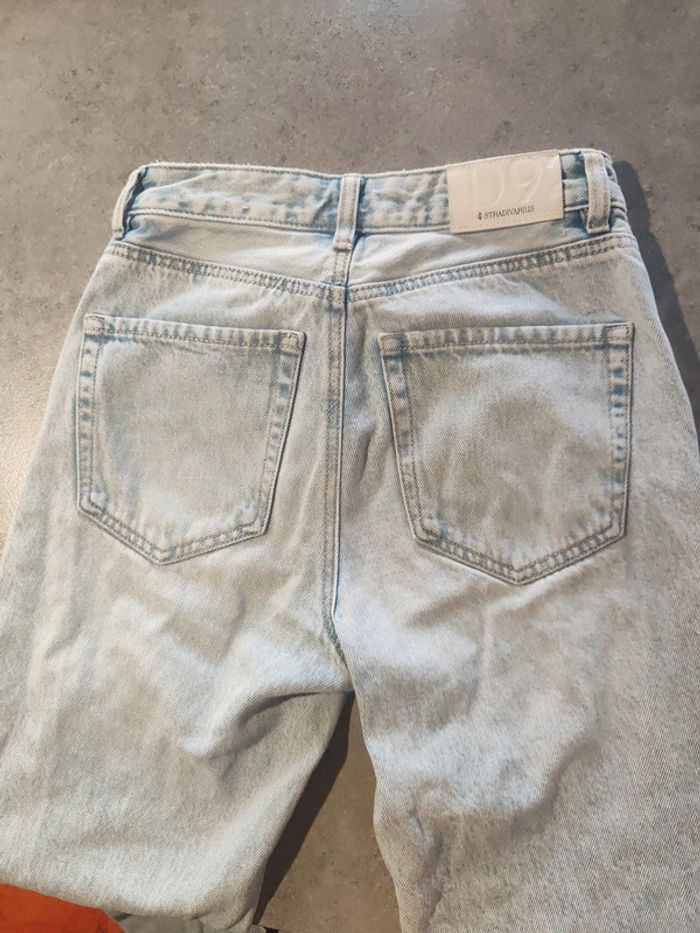Jean à trous Stradivarius pattes d'éléphant bleu clair taille 32 - photo numéro 7