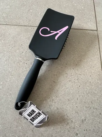 Brosse à cheveux, neuve avec étiquette