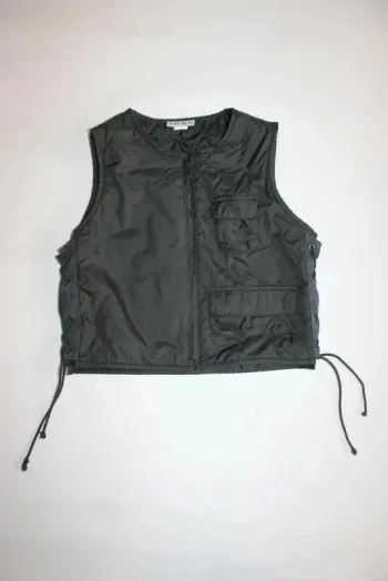 Petite veste matelassée sans manche noire Ikks taille 8 ans