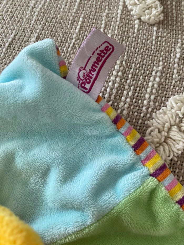 Peluche doudou plat 21cm pommette lion orange et vert très bon état - photo numéro 4