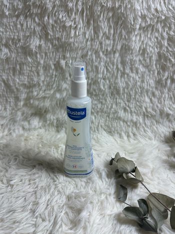 mustela eau coiffante
