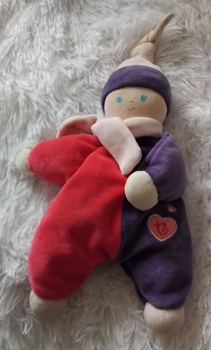 Doudou poupée grelot semi plat fushia et mauve - Corolle