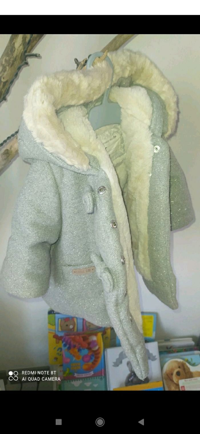 Manteau tape à l'oeil