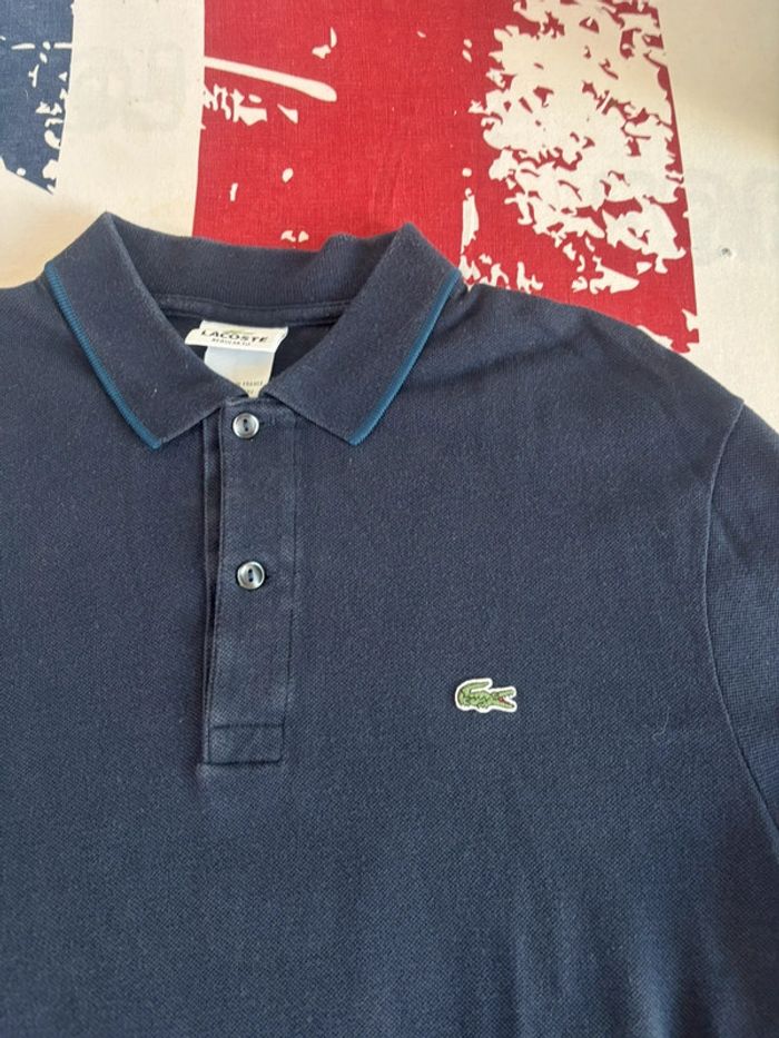 Polo Lacoste taille S/M bleu marine - photo numéro 2