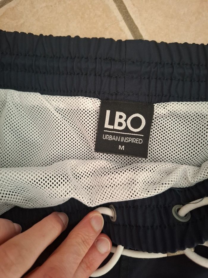 Short de bain av 2 poches (av fermeture) et cordon - photo numéro 2