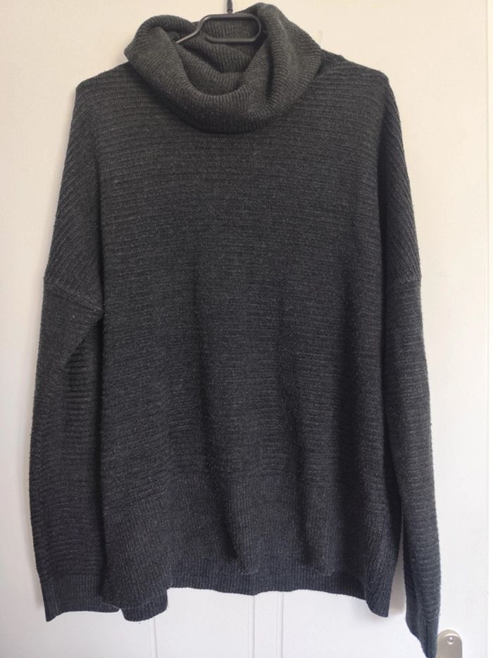 Pull col roulé
