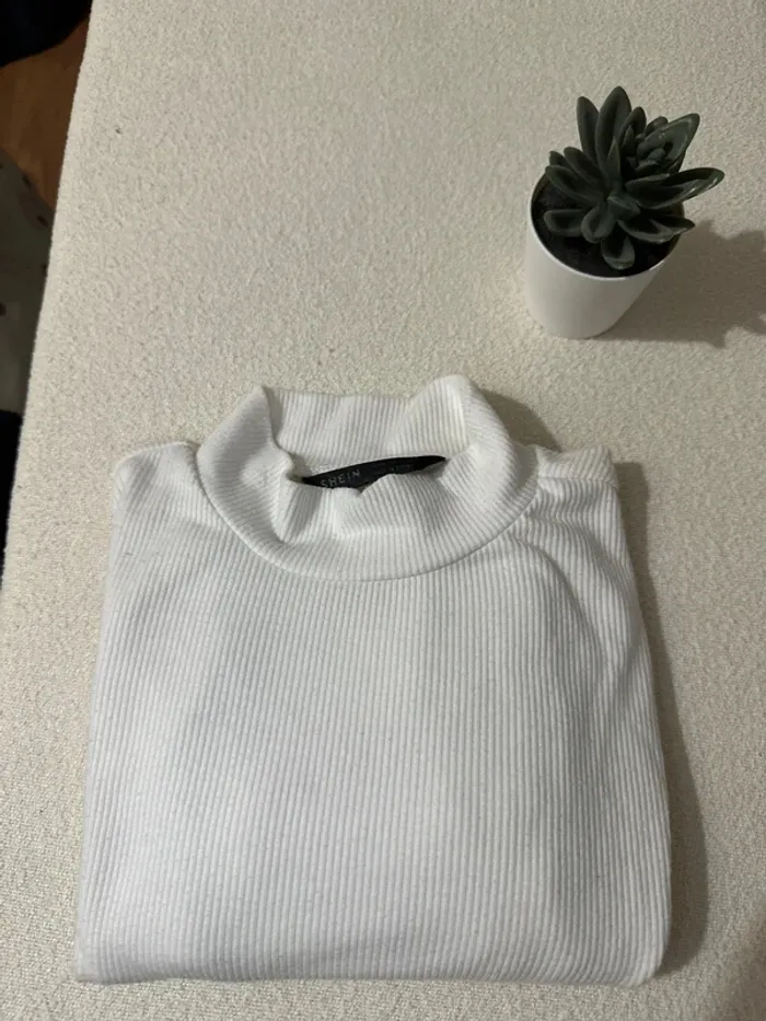 Pull col roulé blanc