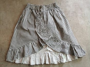 Jupe à carreaux noir et blanc 10 ans essam