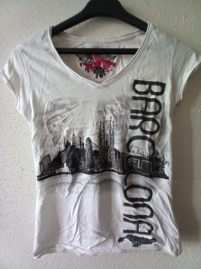 T - short femme blanc avec motif noir T: S