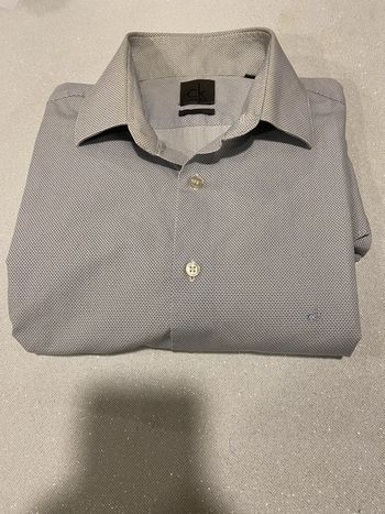Superbe chemise blanche à motif bleu Calvin Klein taille L 40 traces au col sinon impeccable